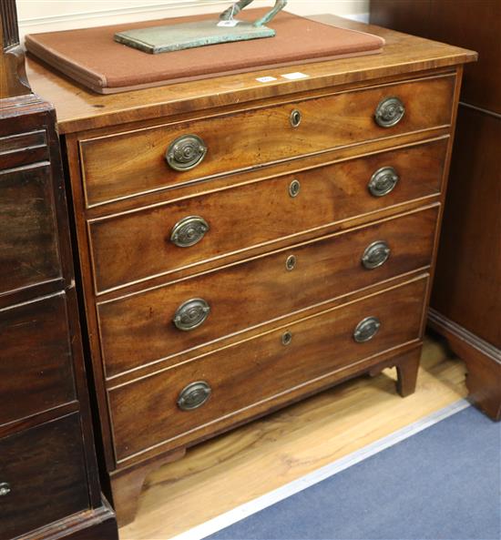 A George III mahogany chest of four long drawers W.90cm